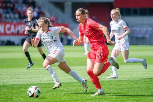 Nia Szenk 13, SC Freiburg and Klara Bühl 17, FC Bayern Munich at the match FC Bayern Munich v SC Freiburg, Football, Women, Google Pixel Women Bundesliga, 2024 2025, Matchday 20 on 27 04 2025 in Munich, FC Bayern Campus DFL and DFB regulations prohibit any use of photographs as image sequences and or quasi video Bayern Germany