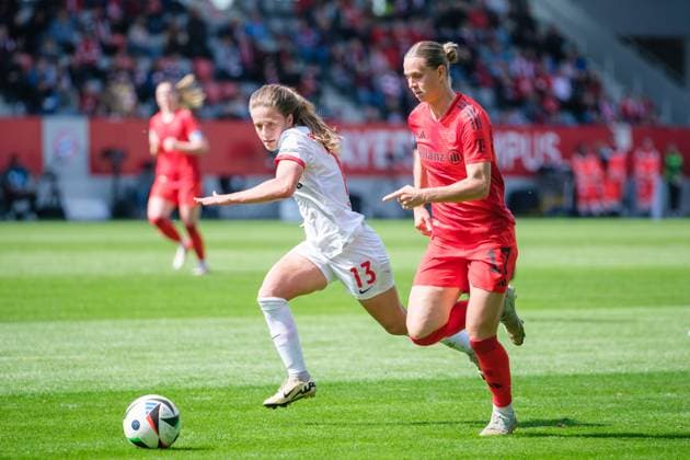 Nia Szenk 13, SC Freiburg and Klara Bühl 17, FC Bayern Munich at the match FC Bayern Munich v SC Freiburg, Football, Women, Google Pixel Women Bundesliga, 2024 2025, Matchday 20 on 27 04 2025 in Munich, FC Bayern Campus DFL and DFB regulations prohibit any use of photographs as image sequences and or quasi video Bayern Germany