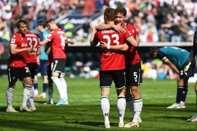 Marcel Halstenberg Hannover 96 and Phil Neumann Hannover 96 celebrates, celebrating during the 2 Bundesliga match between Hannover 96 and 1 FC Köln at Heinz von Heiden Arena on April 27, 2025 in Hanover, Germany Photo by Ralf Treese DeFodi Images Marcel Halstenberg Hannover 96 and Phil Neumann Hannover 96 celebrate, celebrates, celebrating during the 2 Bundesliga match between Hannover 96 and 1 FC Köln at Heinz von Heiden Arena on April 27, 2025 in Hanover, Germany Photo by Ralf Treese DeFodi Images DFB DFL REGULATIONS PROHIBIT ANY USE OF PHOTOGRAPHS AS IMAGE SEQUENCES AND OR QUASI VIDEO Photo by Ralf Treese DeFodi Images