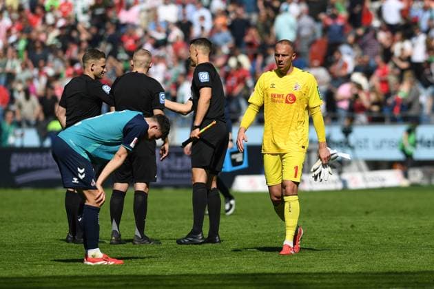 Eric Martel 1 FC Koeln and goalkeeper Marvin Schwaebe 1 FC Koeln looks dejected during the 2 Bundesliga match between Hannover 96 and 1 FC Köln at Heinz von Heiden Arena on April 27, 2025 in Hannover, Germany, Germany Photo by Ralf Treese DeFodi Images Eric Martel 1 FC Koeln and goalkeeper Marvin Schwaebe 1 FC Koeln looks dejected during the 2 Bundesliga match between Hannover 96 and 1 FC Köln at Heinz von Heiden Arena on April 27, 2025 in Hanover, Germany Photo by Ralf Treese DeFodi Images DFB DFL REGULATIONS PROHIBIT ANY USE OF PHOTOGRAPHS AS IMAGE SEQUENCES AND OR QUASI VIDEO Photo by Ralf Treese DeFodi Images