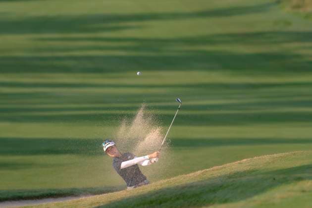 April 27, 2025, The Woodlands, Texas, USA: GRACE KIM (AUS) hits out of the bunker on the 2nd hole during the final round of the 2025 Chevron Championship at The Club at Carlton Woods in The Woodlands, Texas, on Sunday, April 27, 2025. The Woodlands USA - ZUMAp213 20250427_znp_p213_019 Copyright: xLynnxPenningtonx