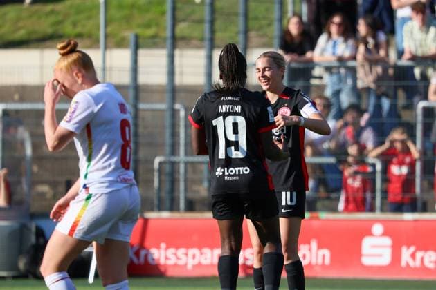 Cologne, Germany 27 April 2025 1 BL Women 2024 2025 1 FC Köln vs Eintracht Frankfurt In the picture from left the second goal scorer Nicole Anyomi Eintracht Frankfurt makes the goal to 2 0 for Eintracht Frankfurt and cheers with Laura Freigang Eintracht Frankfurt DFB regulations prohibit any use of photographs as image sequences and or quasi video Rhein Energie Stadion Nordrhein Westfalen Copyright: xFotostandx xFantinix