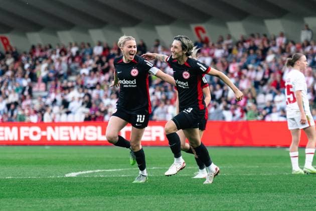 Cologne, Germany 27th April 2025: (Laura Freigang, 10) and (Sara Doorsoun, 23 ) celebrating her goal during the Google Pixel Frauen Bundesliga game between 1. FC Köln and Eintracht Frankfurt at Franz-Kremer Stadium in Cologne, Germany (Leonie Kiehl SPP) Copyright: xLeoniexKiehlx xSPPx spp-en-LeKiSp-_DSC2946