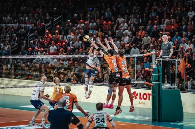 Volleyball Men Season 2024 2025 Volleyball Bundesliga Playoff Final Game 1 BR Volleys vs SVG Lüneburg 27 04 2025 Theo Mohwinkel 8 SVG Lüneburg against the block of Nehemiah Mote 5 BERLIN RECYCLING Volleys and Jake Hanes 22 BERLIN RECYCLING Volleys Berlin Max Schmeling Halle Berlin Germany