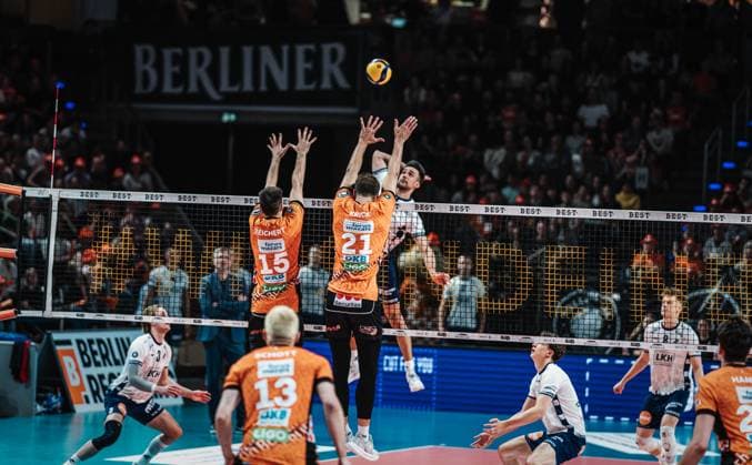 Volleyball Men Season 2024 2025 Volleyball Bundesliga Playoff Final Game 1 BR Volleys vs SVG Lüneburg 27 04 2025 Xander Wolf Wassenaar Ketrzynski 11 SVG Lüneburg against the block of Moritz Reichert 15 BERLIN RECYCLING Volleys and Tobias Krick 21 BERLIN RECYCLING Volleys Berlin Max Schmeling Halle Berlin Germany