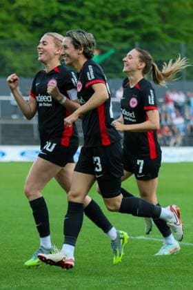 Cologne, Germany 27 April 2025 1 BL Women 2024 2025 1 FC Köln vs Eintracht Frankfurt In the picture from left scorer Laura Freigang Eintracht Frankfurt scores the goal to make it 3 0 for Eintracht Frankfurt and cheers with Sara Doorsoun Eintracht Frankfurt and Lara Prasnikar Eintracht Frankfurt DFB regulations prohibit any use of photographs as image sequences and or quasi video Rhein Energie Stadion Nordrhein Westfalen Copyright: xFotostandx xFantinix
