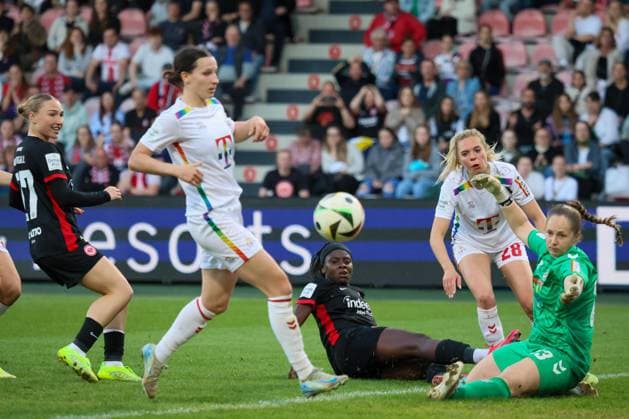 Cologne, Germany 27 April 2025 1 BL Women 2024 2025 1 FC Köln vs Eintracht Frankfurt In the picture goalkeeper Aurora Mikalsen 1 FC Köln , right in the picture, defends a ball from Nicole Anyomi Eintracht Frankfurt and prevents a goal for Frankfurt DFB regulations prohibit any use of photographs as image sequences and or quasi video Rhein Energie Stadion Nordrhein Westfalen Copyright: xFotostandx xFantinix