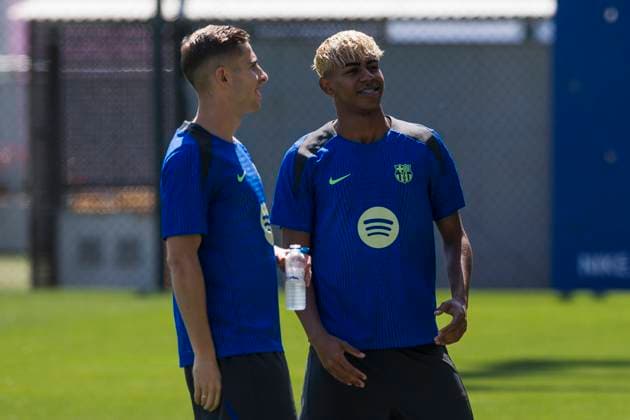 FC Barcelona, Barca training Lamine Yamal (R) of FC Barcelona speaks with Fermin Lopez of FC Barcelona during the training of FC Barcelona on the eve of the UEFA Champions League 2024 25 semi-final first leg football match against FC Internazionale. Sant Joan Despi Spain Copyright: xNicolòxCampox