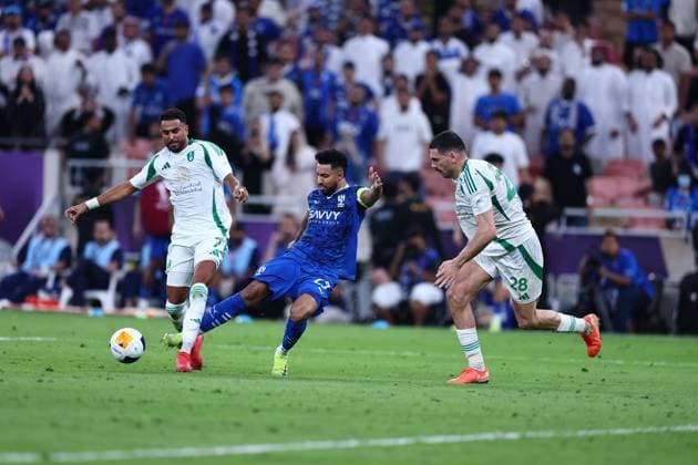 Al-Hilal FC vs Al-Ahli FC - AFC Champions League Elite Semi Finals JEDDAH, SAUDI ARABIA - April 29: Salem Al-Dawsari of Team Al-Hilal FC competes for the ball with Riyad Mahrez of Team AL-Ahli during the AFC Champions League Elite Semi Finals match between Al-Hilal FC and Al-Ahli FC FC at King Abdullah Sports City Stadium on April 29, 2025 in Jeddah, Saudi Arabia. Jeddah Saudi Arabia Copyright: xAbdullahxAhmedx