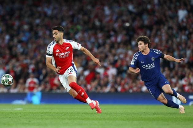 April 29, 2025, London, United Kingdom: MIKEL MERINO of Arsenal is chased by JOAO NEVES of PSG in the UEFA 2024 25 Semi-Final first leg game between ARSENAL and PARIS SAINT GERMAIN at the Emirates Stadium in London, England London United Kingdom - ZUMAc179 20250429_zep_c179_225 Copyright: xMickaelxChavetx