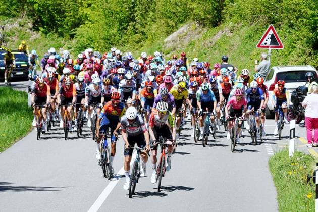 30 04 025 Cycling race Tour de Romandie 1 stage Muenchenstein Freibourg The field of riders on the climb to Hochwald SO At the front Silvan Dillier SUI Team Alpecin Action
