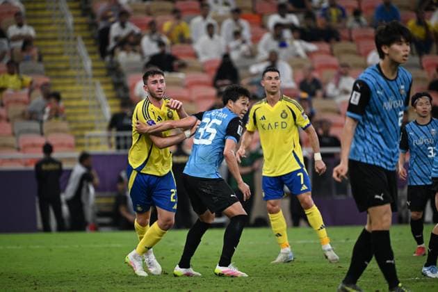 Al Nassr Club (KSA) vs Kawasaki Frontale (JPN) JEDDAH, SAUDI ARABIA - APRIL 30: LAPORTE feels pressure from MARUYAMA . Al Nassr Club (KSA) vs Kawasaki Frontale (JPN) during the AFC Champions League Elite match betweenc at alinma bank stadium at king abdullah sports city.