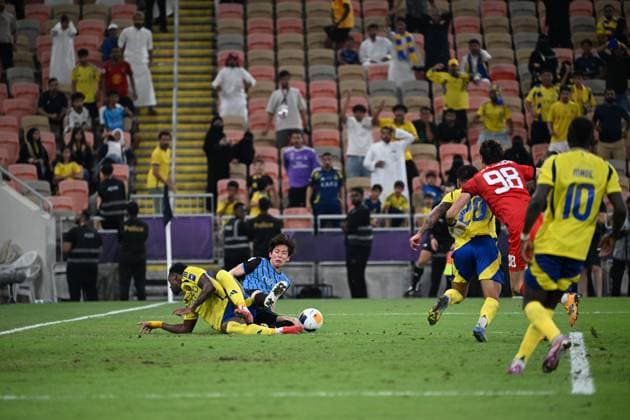 Al Nassr Club (KSA) vs Kawasaki Frontale (JPN) JEDDAH, SAUDI ARABIA - APRIL 30: SOTA Fierce duel for possession. Nassr Club (KSA) vs Kawasaki Frontale (JPN) during the AFC Champions League Elite match betweenc at alinma bank stadium at king abdullah sports city.