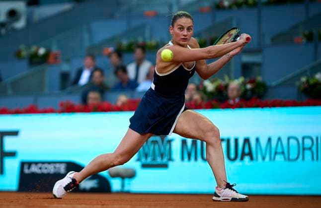 (250501) -- MADRID, May 1, 2025 -- Marta Kostyuk competes during the women s singles quarterfinal between Aryna Sabalenka of Belarus and Marta Kostyuk of Ukraine at the Madrid Open tennis tournament, in Madrid, Spain, April 30, 2025. (Photo by Xinhua) (SP)SPAIN-MADRID-TENNIS-MADRID OPEN-WOMEN S SINGLES PabloxMorano 