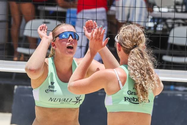 (250501) -- LAGUNA PROVINCE, May 1, 2025 -- Charlotte Graham (R) Emma Hannagan of Australia celebrate scoring during the women s qualification match between Kathrina Epa Honey Grace Cordero of the Philippines and Charlotte Graham Emma Hannagan of Australia at the Volleyball World Beach Pro Tour Futures in Laguna Province, the Philippines, May 1, 2025. ) (SP)PHILIPPINES-LAGUNA PROVINCE Beach volleyball, Beachvolleyball BEACH PRO TOUR FUTURES ROUELLExUMALI 