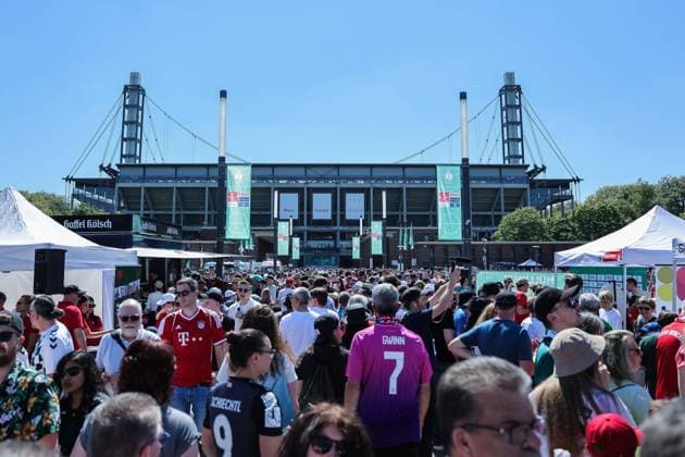 Soccer DFB Cup Womens Final FC Bayern Munich SV Werder Bremen on 01 05 2025 at the RheinEnergieStadion in Cologne Many people are standing on the lawn in front of the RheinEnergieStadion DFB regulations prohibit any use of photographs as image sequences and or quasi video xJRx