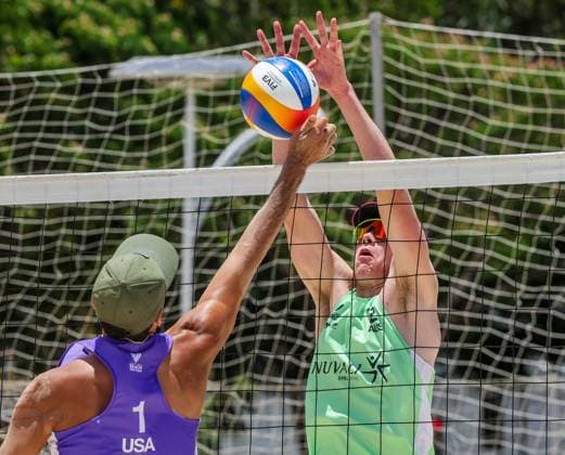 (250501) -- LAGUNA PROVINCE, May 1, 2025 -- Killian Donovan (Rear) of Australia competes against Leigh Sinoto of the United States during the men s qualification match between Jett Rocker-Graham Killian Donovan of Australia and Leigh Sinoto Cody Price of the United States at the Volleyball World Beach Pro Tour Futures in Laguna Province, the Philippines, May 1, 2025. ) (SP)PHILIPPINES-LAGUNA PROVINCE Beach volleyball, Beachvolleyball BEACH PRO TOUR FUTURES ROUELLExUMALI 