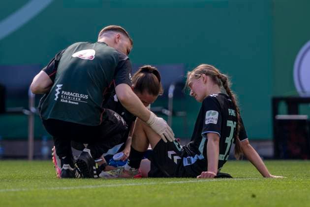 01 05 2025 FC Bayern Munich SV Werder Bremen, DFB Pokal Women, season 2024 2025, final, at RheinEnergie Stadium in Cologne Bremens Maria Penner is treated Important note According to the regulations of the DFL German Football League and the DFB German Football Association, it is prohibited to use or have used photographs taken in the stadium and or of the match in the form of sequential images and or video-like photo series Copyright: xDavidxInderliedx
