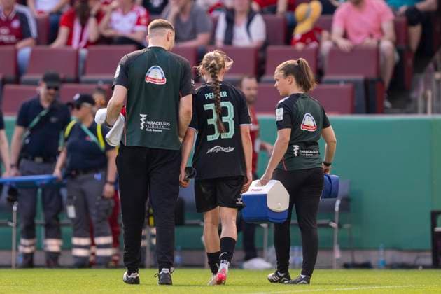 01 05 2025 FC Bayern Munich SV Werder Bremen, DFB Pokal Women, season 2024 2025, final, at RheinEnergie Stadium in Cologne Bremens Maria Penner is treated Important note According to the regulations of the DFL German Football League and the DFB German Football Association, it is prohibited to use or have used photographs taken in the stadium and or of the match in the form of sequential images and or video-like photo series Copyright: xDavidxInderliedx