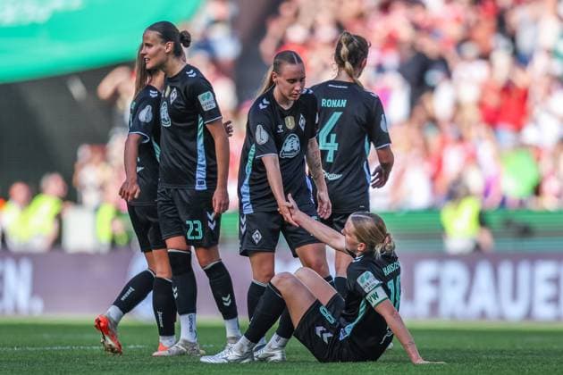 Soccer DFB Cup Womens Final FC Bayern Munich SV Werder Bremen on 01 05 2025 at RheinEnergieStadion in Cologne Emöke Papai Bremen , left Lina Hausicke Bremen , disappointed on the ground DFB regulations prohibit any use of photographs as image sequences and or quasi video xJRx
