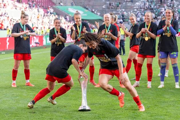 01 05 2025 FC Bayern Munich SV Werder Bremen, DFB Pokal Women, season 2024 2025, final, at the RheinEnergie Stadium in Cologne Munichs Tuva Hansen l and Munichs Jovana Damnjanovic dance for the cup Important note According to the regulations of the DFL German Football League and the DFB German Football Association, it is prohibited to use or have used photographs taken in the stadium and or of the match in the form of sequential images and or video-like photo series Copyright: xDavidxInderliedx