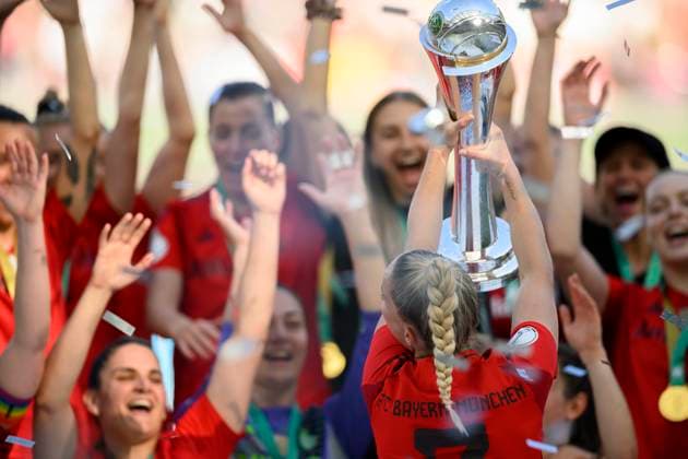 Award ceremony, cheering Team M with the trophy held by Giulia GWINN M DFB Pokal Final Women 2025, FC Bayern Muenchen M SV Werder Bremen HB 4 2, on 01 05 2025 in Koeln Germany DFB regulations prohibit any use of photographs as image sequences and or quasi video Â