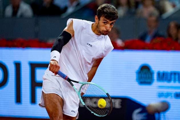 Mutua Madrid Open 2025 Lorenzo Musetti of Italy plays a backhand against Gabriel Diallo of Canada during the Men s Singles Quarter-Final match at the Mutua Madrid Open 2025 tournament celebrated at La Caja Magica on May 01, 2025 in Madrid, Spain. Madrid La Caja Magica Madrid Spain Copyright: xAlbertoxGardinx AGardin_20250501_Mutua_Madrid_Open_0860