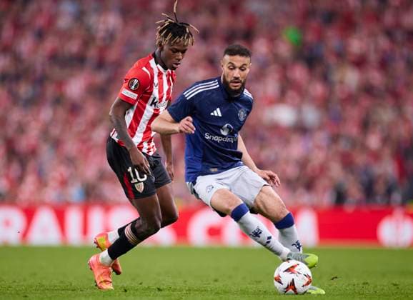 Athletic Club v Manchester United, ManU - UEFA Europa League 2024 25 Semi Final First Leg Nico Williams of Athletic Club competes for the ball with Noussair Mazraoui of Manchester United during the UEFA Europa League 2024 25 Semi Final First Leg match between Athletic Club and Manchester United at San Mames on May 1, 2025, in Bilbao, Spain. Bilbao San Mames Basque Country Spain RL_ATHvMUTD_EL_000123 Copyright: xRicardoxLarreinax