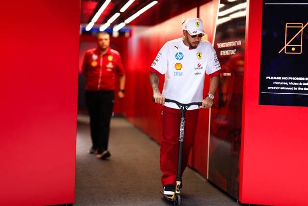 F1 Grand Prix Of Miami - Media Day Paddock And Hospitality Suites Lewis Hamilton emerges from the Ferrari garage at the Miami International Autodrome in Miami, Florida, on May 1, 2025, ahead of the Formula 1 Crypto.com Miami Grand Prix. Miami, Florida United States  Copyright: xReginaldxMathalonex originalFilename:mathalone-notitle250501_np6dy.jpg