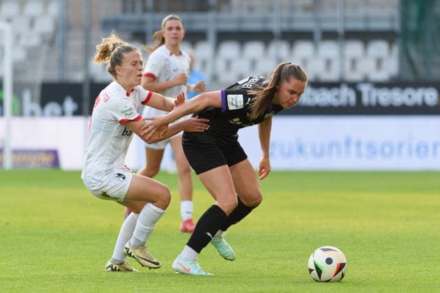 Nia Szenk (13 SC Freiburg) and Lilli Purtscheller (7 SGS Essen) during the Google Pixel Frauen Bundesliga match between SGS Essen and SC Freiburg at Stadion an der Hafenstrasse, Essen, Germany. (Sven Beyrich SPP) Copyright: xSvenxBeyrich SPPx spp-en-SvBe-20250502-D4S_0747