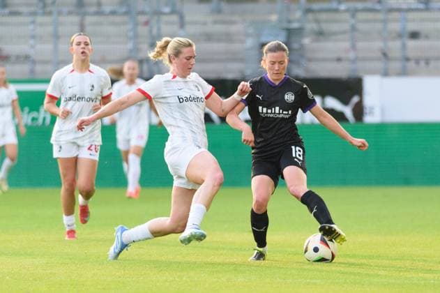 Annie Karich (6 SC Freiburg) and Lena Ostermeier (18 SGS Essen) during the Google Pixel Frauen Bundesliga match between SGS Essen and SC Freiburg at Stadion an der Hafenstrasse, Essen, Germany. (Sven Beyrich SPP) Copyright: xSvenxBeyrich SPPx spp-en-SvBe-20250502-D4S_0752