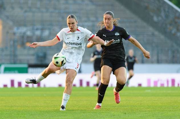 Alina Axtmann (3 SC Freiburg) and Laureta Elmazi (11 SGS Essen) during the Google Pixel Frauen Bundesliga match between SGS Essen and SC Freiburg at Stadion an der Hafenstrasse, Essen, Germany. (Sven Beyrich SPP) Copyright: xSvenxBeyrich SPPx spp-en-SvBe-20250502-D4S_0788