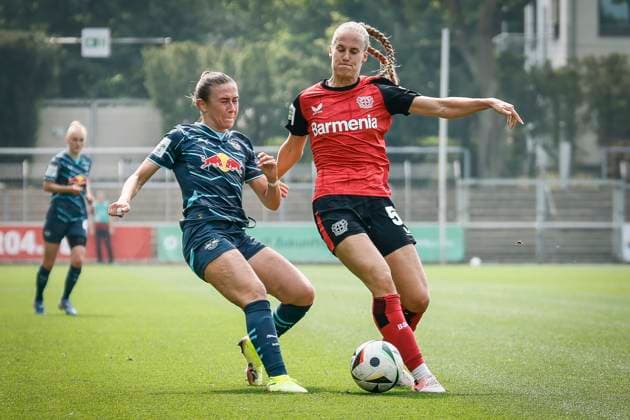 Womens Soccer Bundesliga Bayer 04 Leverkusen RB Leipzig, 03 05 2025 duel between Lara Marti RB Leipzig, 30 and Juliette Vidal Bayer 04 Leverkusen, 56 Bayer 04 Leverkusen RB Leipzig on matchday 21 of the Google Pixel Womens Bundesliga on 03 05 2025 at Ulrich Haberland Stadium in Leverkusen North Rhine-Westphalia DFL REGULATIONS PROHIBIT ANY USE OF PHOTOGRAPHS AS IMAGE SEQUENCES AND OR QUASI VIDEO Copyright: xBEAUTIFULxSPORTS AxelxKohringx