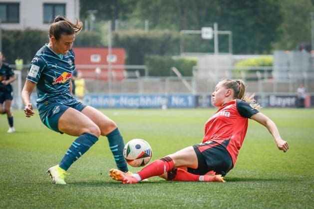 Womens Soccer Bundesliga Bayer 04 Leverkusen RB Leipzig, 03 05 2025 duel between Lara Marti RB Leipzig, 30 and Janou Levels Bayer 04 Leverkusen, 5 Bayer 04 Leverkusen RB Leipzig on matchday 21 of the Google Pixel Womens Bundesliga on 03 05 2025 at Ulrich Haberland Stadium in Leverkusen North Rhine-Westphalia DFL REGULATIONS PROHIBIT ANY USE OF PHOTOGRAPHS AS IMAGE SEQUENCES AND OR QUASI VIDEO Copyright: xBEAUTIFULxSPORTS AxelxKohringx