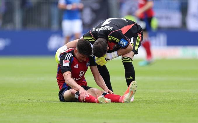 03 05 2025, xdcx, Soccer 2 Bundesliga, SV Darmstadt 98 Hamburger SV, emonline, emspor, despor, v l , Dennis Hadzikadunic Hamburger SV injured on the ground, Goalkeeper Daniel Heuer Fernandes Hamburger SV DFL DFB REGULATIONS PROHIBIT ANY USE OF PHOTOGRAPHS AS IMAGE SEQUENCES AND OR QUASI VIDEO Copyright: HMBxMedia Claus