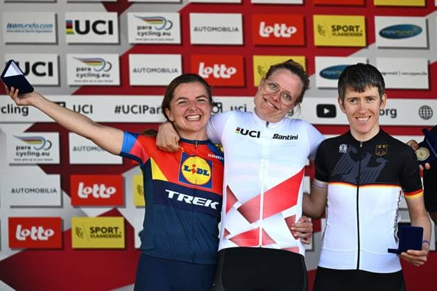 L-R, second WT2 Poland s Rita Malinkiewicz, winner WT2 Denmark s Emma Lund and third WT2 Germany s Jana Majunke celebarte on the podium at the road races at the UCI Para-Cycling Road World Cup event, Saturday 03 May 2025, in Brugge. The UCI Para-Cycling Road World Cup takes place from 01 to 04 May in Oostende and Brugge. LUCxCLAESSEN  x122532556x