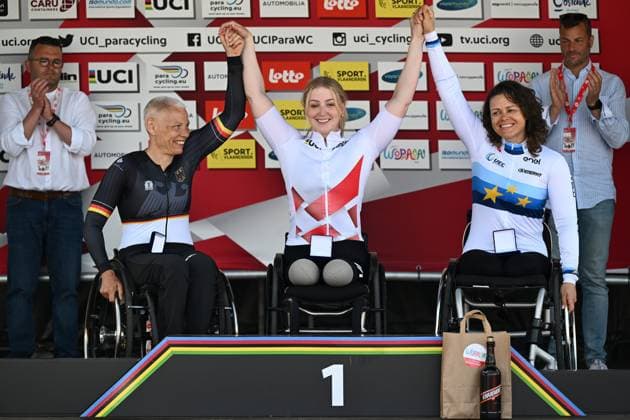 L-R, second WH5 Germany s Andrea Eskau, winner WH5 Netherlands Chantal Haenen and third WH5 Italy s Ana Maria Vitelaru celebrate on the podium at the road races at the UCI Para-Cycling Road World Cup event, Saturday 03 May 2025, in Brugge. The UCI Para-Cycling Road World Cup takes place from 01 to 04 May in Oostende and Brugge. LUCxCLAESSEN  x122532751x