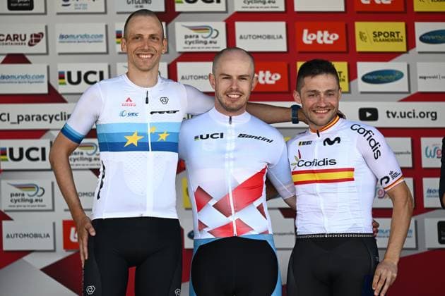 L-R, second MT2 Austria s Wolfgang Steinbichler, winner MT2 Belgium s Tim Celen and third MT2 Spain s Joan Reinoso Figuerola celebrate on the podium at the road races at the UCI Para-Cycling Road World Cup event, Saturday 03 May 2025, in Brugge. The UCI Para-Cycling Road World Cup takes place from 01 to 04 May in Oostende and Brugge. LUCxCLAESSEN  x122532905x