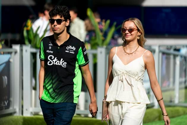 Brazilian Formula One driver Gabriel Bortoleto of Stake F1 Team and his girlfriend Isabela Bernardini arrive during the Formula One Miami Grand Prix at the Miami International Autodrome in Miami Gardens, Florida on Saturday, May 3, 2025.  MIA2025050306 GREGxNASH