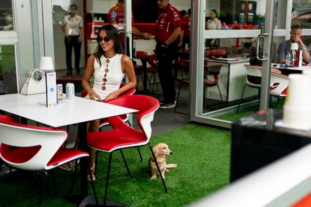 Alexandra Saint Mleux, the girlfriend of Monaco s Formula One driver Charles Leclerc of Scuderia Ferrari, and his dog Leo are seen in the paddock during the Formula One Miami Grand Prix at the Miami International Autodrome in Miami Gardens, Florida on Saturday, May 3, 2025.  MIA2025050314a GREGxNASH
