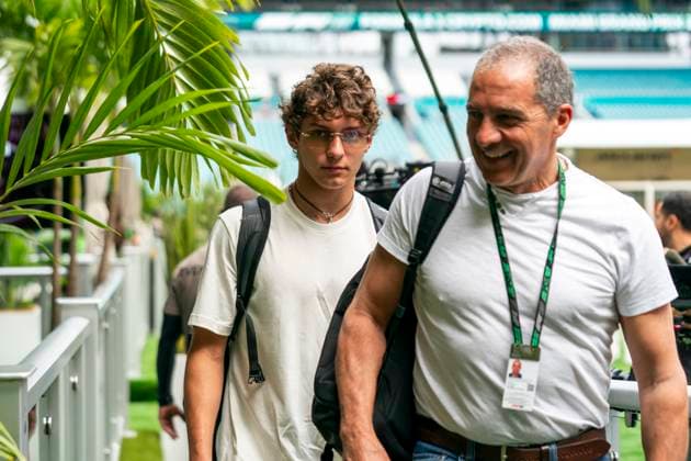 Italian Formula One driver Andrea Kimi Antonelli of Mercedes-AMG Petronas and his dad Marco arrive during the Formula One Miami Grand Prix at the Miami International Autodrome in Miami Gardens, Florida on Saturday, May 3, 2025.  MIA2025050316 GREGxNASH