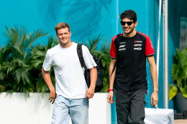 German Formula One reserve driver Mick Schumacher of Mercedes-AMG Petronas and French Formula One driver Esteban Ocon of Haas F1 Team arrive during the Formula One Miami Grand Prix at the Miami International Autodrome in Miami Gardens, Florida on Saturday, May 3, 2025.  MIA2025050322 GREGxNASH