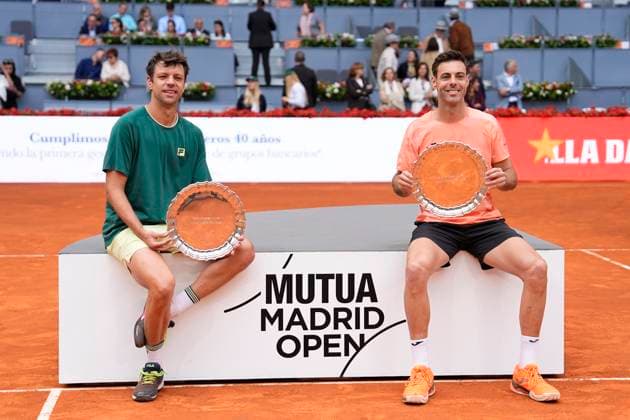 May 3, 2025, Madrid, Madrid, Spain: Horacio Zeballos of Argentina and Marcel Granollers of Spain pose with the winners trophies after winning against Marcelo Arevalo of El Salvador and Mate Pavic of Croatia during the Men DoubleÃ¢â‚¬â ¢s Final of Mutua Madrid Open 2025 - ATP, Tennis Herren Masters 1000 celebrated at Caja Magica on May 03, 2025 in Madrid, Spain. Madrid Spain - ZUMAa181 20250503_zaa_a181_107 Copyright: xOscarxJ.xBarrosox