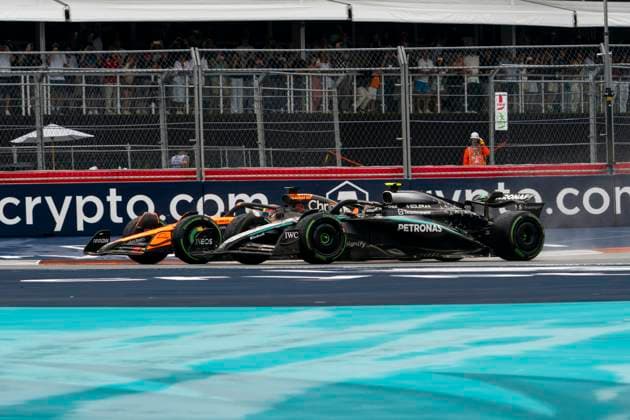 Australian Formula One driver Oscar Piastri of McLaren F1 Team passes Italian Formula One driver Andrea Kimi Antonelli of Mercedes-AMG Petronas during the sprint race at the Formula One Miami Grand Prix at the Miami International Autodrome in Miami Gardens, Florida on Saturday, May 3, 2025.  MIA2025050334 GREGxNASH