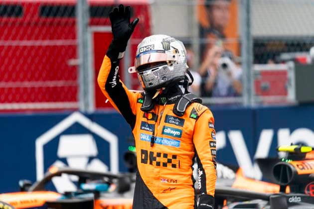 British Formula One driver Lando Norris of McLaren F1 Team waves to fans after winning the sprint race at the Formula One Miami Grand Prix at the Miami International Autodrome in Miami Gardens, Florida on Saturday, May 3, 2025.  MIA2025050344 GREGxNASH