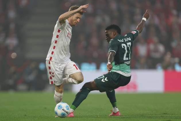Florian Kainz 1 FC Koeln and Frederic Ananou SSV Jahn Regensburg battle for the ball during the 2 Bundesliga match between 1 FC Koeln and Jahn Regensburg at RheinEnergieStadion on May 03, 2025 in Cologne, Germany, Germany Photo by Oliver Kaelke DeFodi Images Florian Kainz 1 FC Koeln and Frederic Ananou SSV Jahn Regensburg battle for the ball during the 2 Bundesliga match between 1 FC Köln and Jahn Regensburg at RheinEnergieStadion on May 3, 2025 in Cologne, Germany Photo by Oliver Kaelke DeFodi Images DFB DFL REGULATIONS PROHIBIT ANY USE OF PHOTOGRAPHS AS IMAGE SEQUENCES AND OR QUASI VIDEO Photo by Oliver Kaelke DeFodi Images