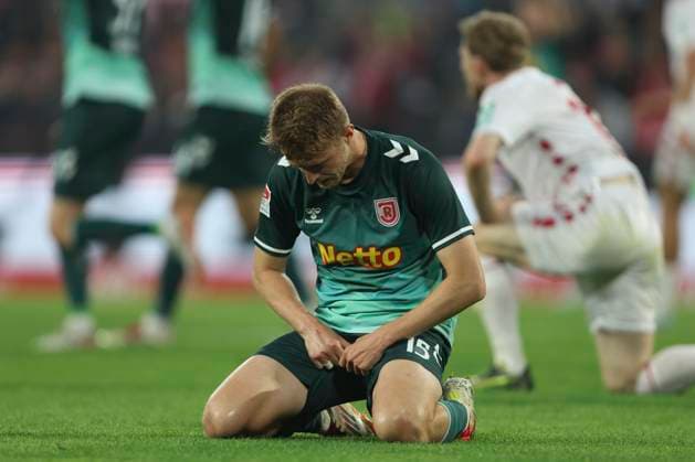 Sebastian Ernst SSV Jahn Regensburg is disappointed during the 2 Bundesliga match between 1 FC Köln and Jahn Regensburg at RheinEnergieStadion on May 03, 2025 in Cologne, Germany Photo by Oliver Kaelke DeFodi Images Sebastian Ernst SSV Jahn Regensburg looks dejected during the 2 Bundesliga match between 1 FC Köln and Jahn Regensburg at RheinEnergieStadion on May 3, 2025 in Cologne, Germany Photo by Oliver Kaelke DeFodi Images DFB DFL REGULATIONS PROHIBIT ANY USE OF PHOTOGRAPHS AS IMAGE SEQUENCES AND OR QUASI VIDEO Photo by Oliver Kaelke DeFodi Images