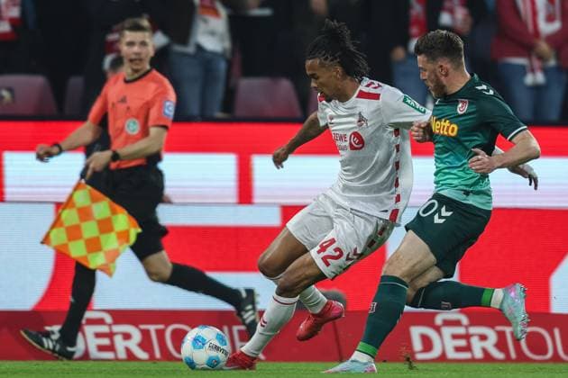 Soccer 2 Bundesliga 32 Matchday 1 FC Köln SSV Jahn Regensburg on 03 05 2025 at RheinEnergieStadion in Cologne Damion Downs Köln , left Christian Kühlwetter Regensburg , right DFL regulations prohibit any use of photographs as image sequences and or quasi video xJRx