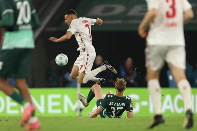 Dejan Ljubicic 1 FC Koeln and Leopold Wurm SSV Jahn Regensburg battle for the ball during the 2 Bundesliga match between 1 FC Köln and Jahn Regensburg at RheinEnergieStadion on May 03, 2025 in Cologne, Germany, Germany Photo by Oliver Kaelke DeFodi Images Dejan Ljubicic 1 FC Koeln and Leopold Wurm SSV Jahn Regensburg battle for the ball during the 2 Bundesliga match between 1 FC Köln and Jahn Regensburg at RheinEnergieStadion on May 3, 2025 in Cologne, Germany Photo by Oliver Kaelke DeFodi Images DFB DFL REGULATIONS PROHIBIT ANY USE OF PHOTOGRAPHS AS IMAGE SEQUENCES AND OR QUASI VIDEO Photo by Oliver Kaelke DeFodi Images