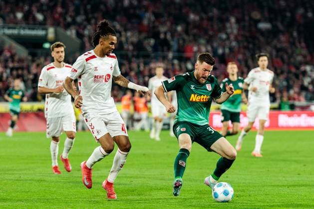 2 Soccer Bundesliga 1 FC Köln SSV Jahn Regensburg 03 05 2025 duel Damion Downs 1 FC Köln, 42 , Christian Kühlwetter SSV Jahn Regensburg, 30 2 Soccer Bundesliga, 1 FC Köln SSV Jahn Regensburg, Köln, Rheinenergiestadion am 03 05 2025 DFL REGULATIONS PROHIBIT ANY USE OF PHOTOGRAPHS AS IMAGE SEQUENCES AND OR QUASI VIDEO Copyright: xBEAUTIFULxSPORTS Wunderlx
